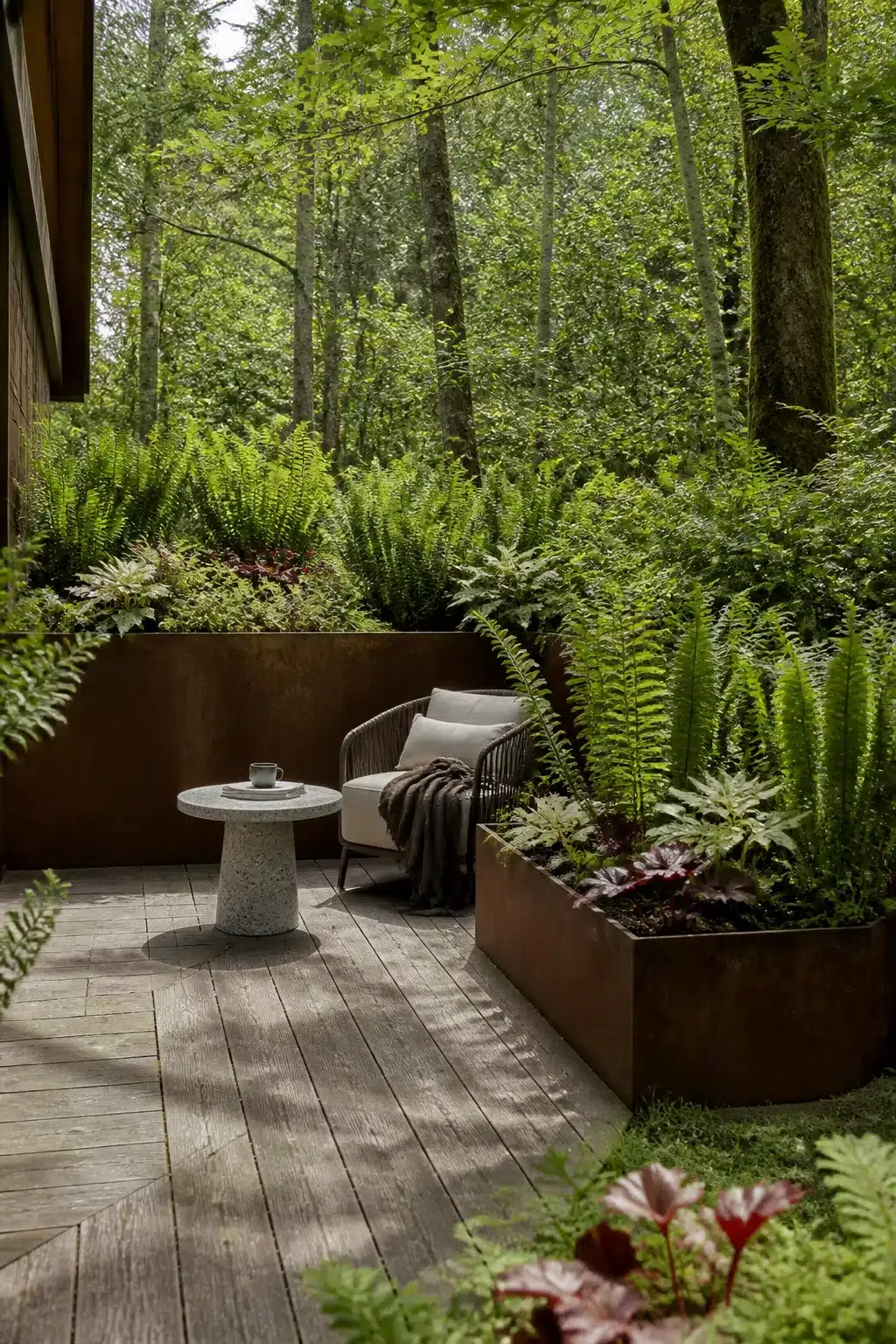Corten steel raised fern beds on a wood deck in a shaded woodland courtyard garden with rope lounge chair